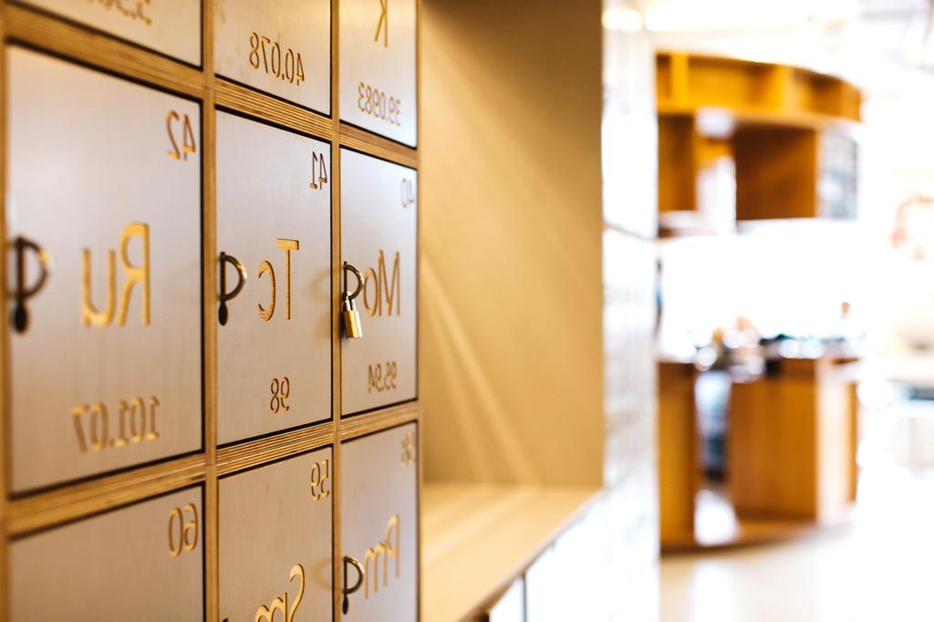 Traveler budgeting expenses with laptop and notebook